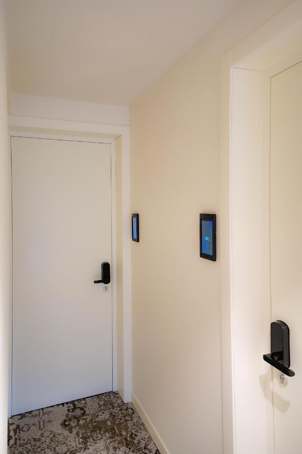 Bergamo Inn 15 Екстер'єр фото A wall mounted tablet